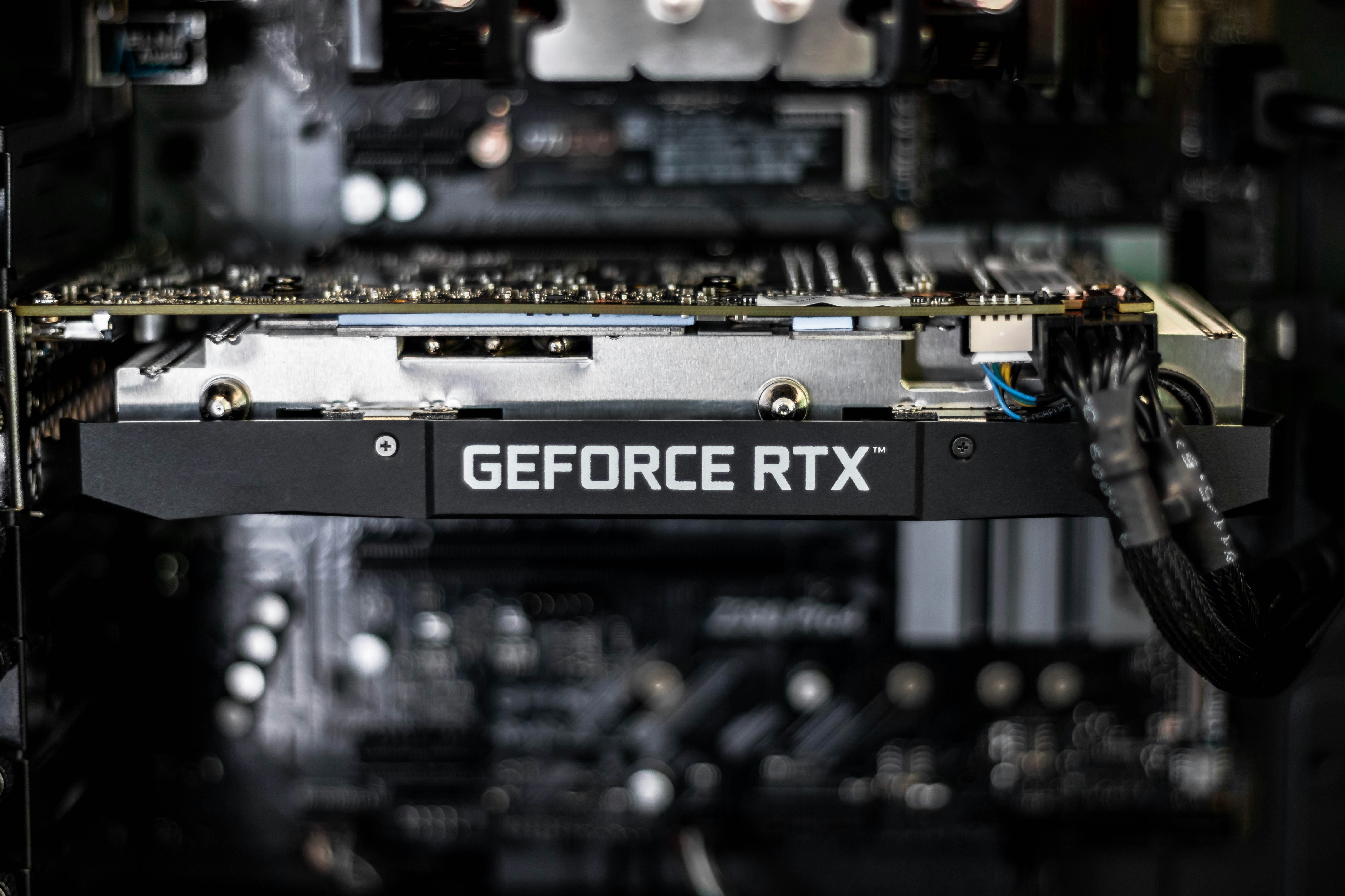 selective focus photography of GEFORCE RTX graphics card